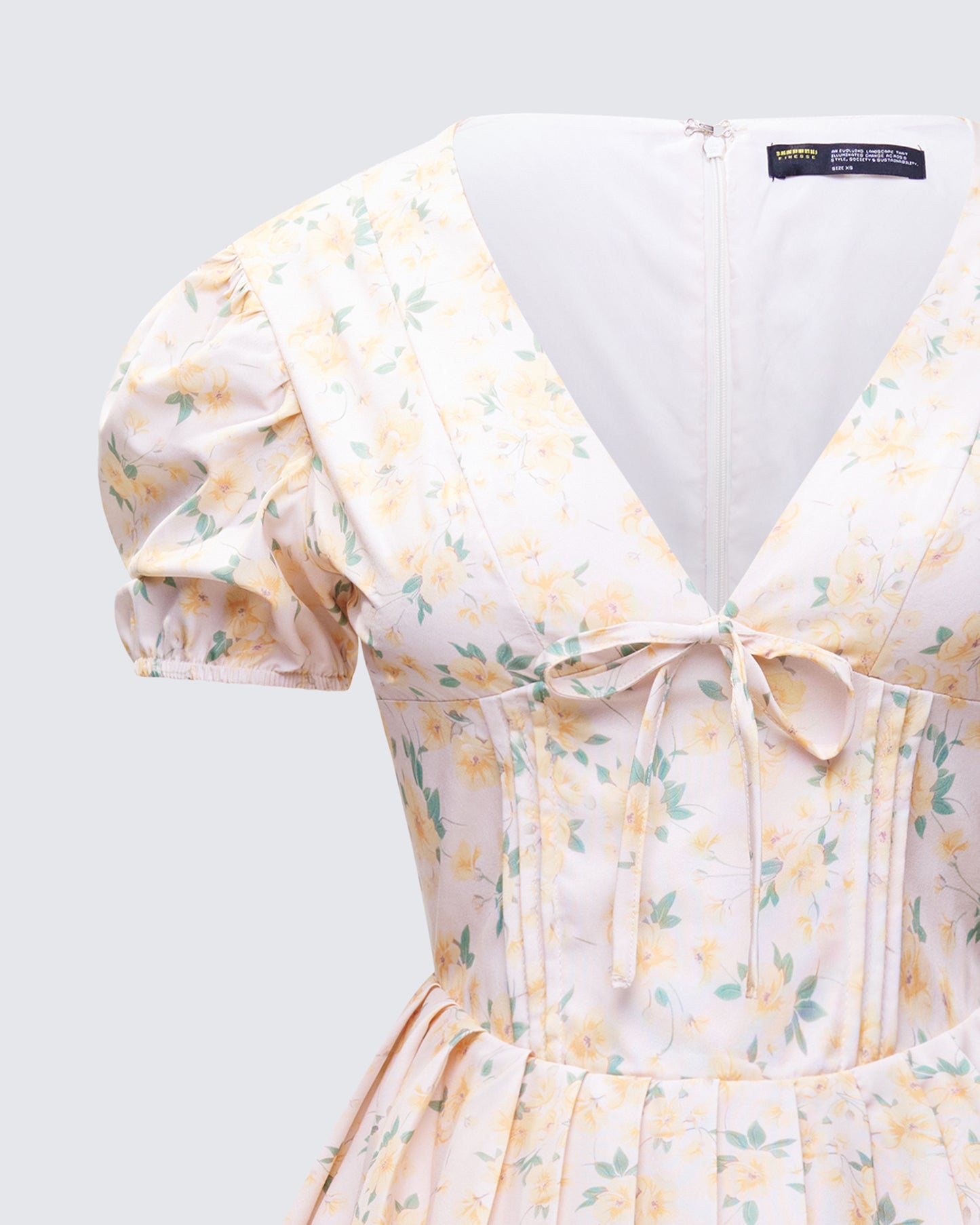 Nyla Yellow Floral Pleated Mini Dress