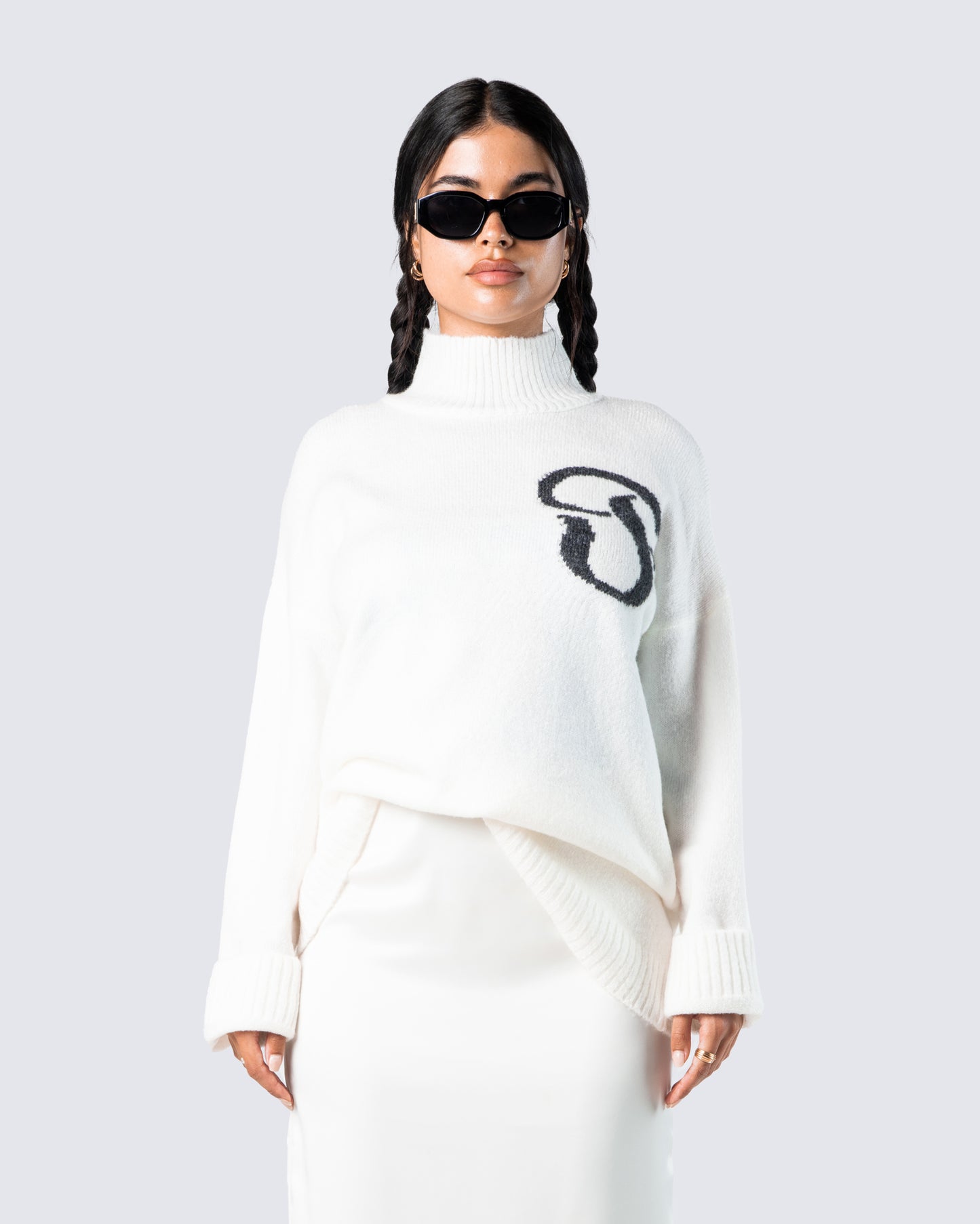 Conner Ivory Sweater Knit Top model front