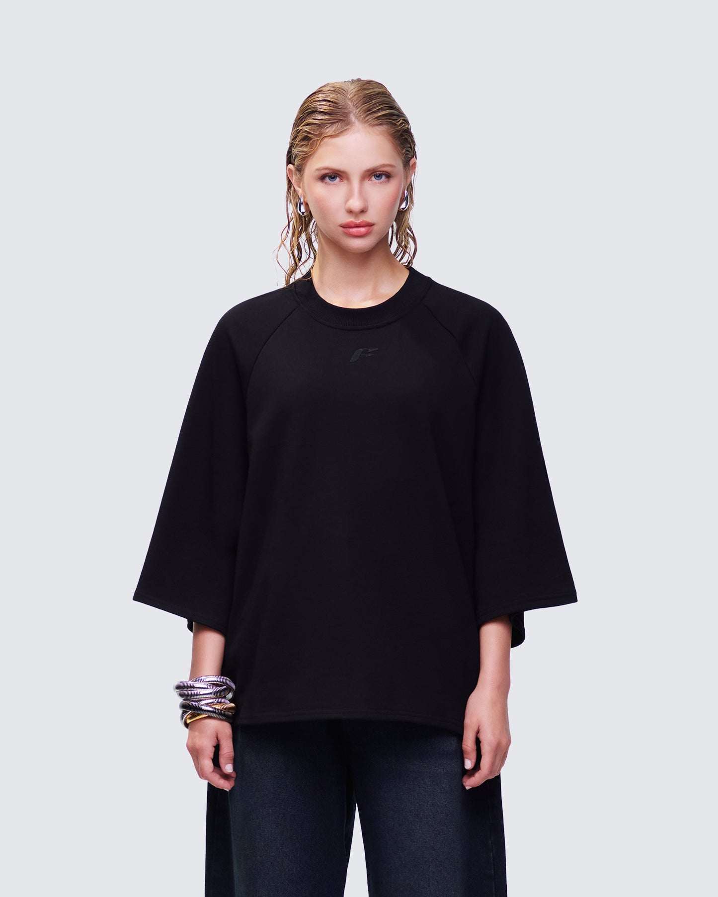 Mabelle Black Oversized Raglan Top model front
