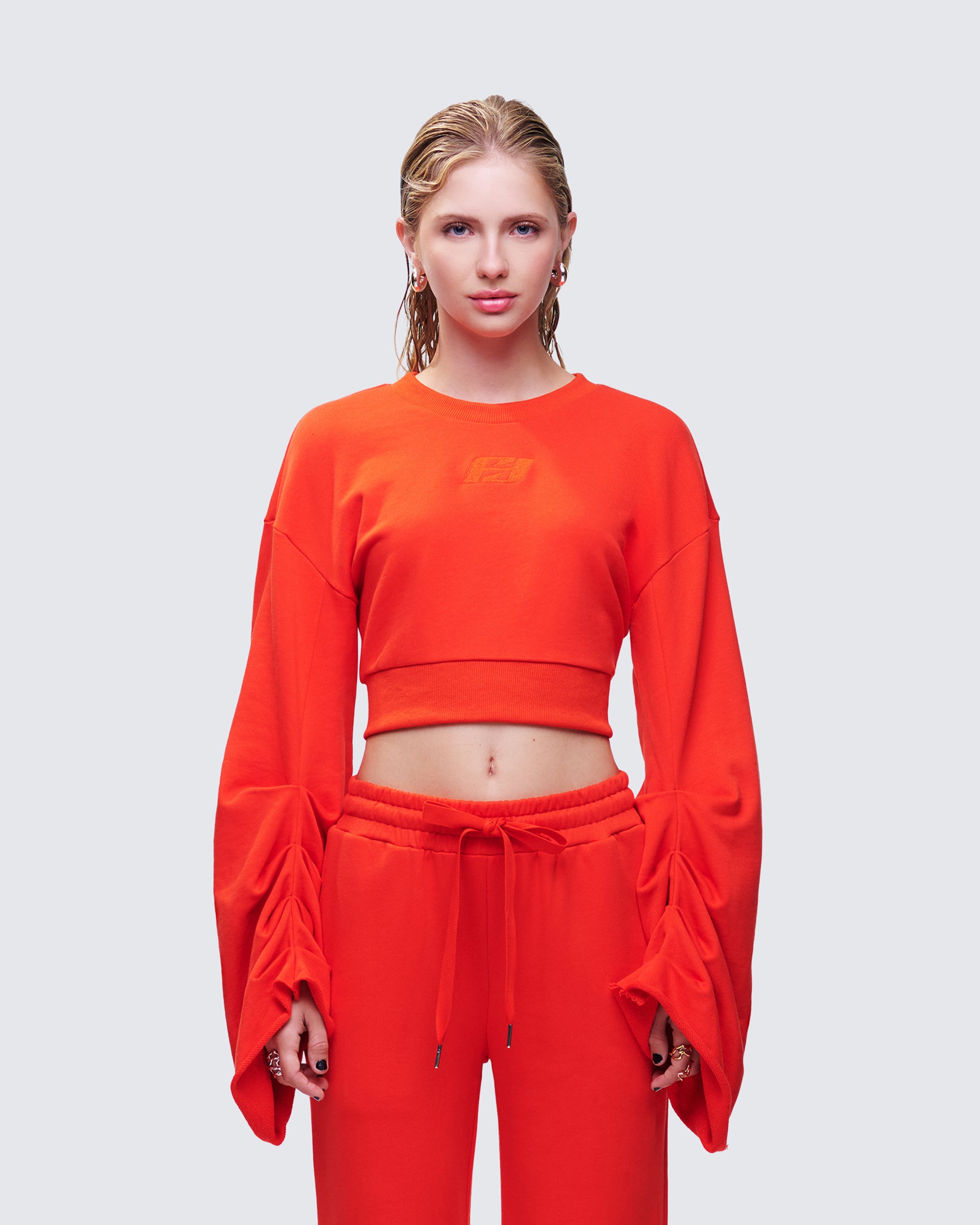 Una Red Stacked Sleeve Sweatshirt model front