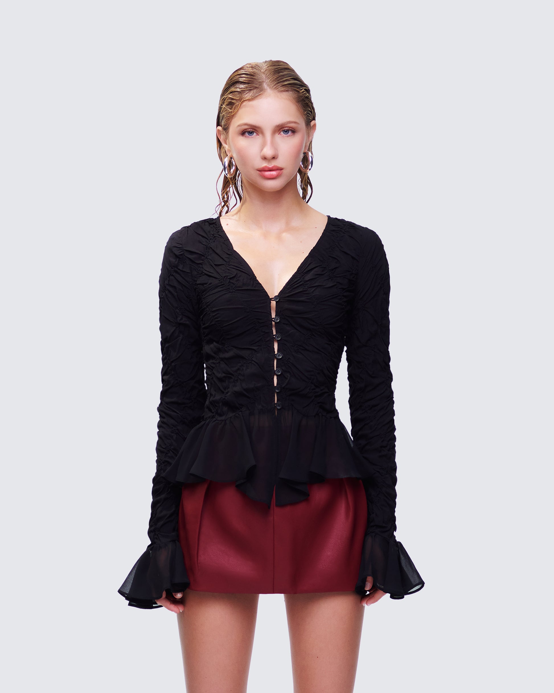 Eilis Black Texture Flute Cuff Blouse model front