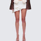 Zefira Ivory Fur Trim Distressed Mini Skirt model front