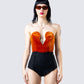 Rae Orange Velvet Strapless Top model front