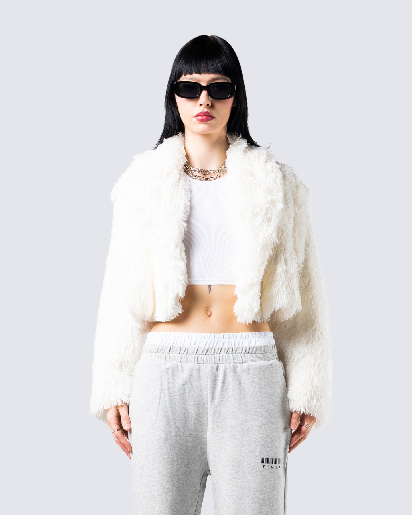 Estella Ivory Vegan Fur Coat model front