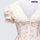 Nyla Yellow Floral Pleated Mini Dress