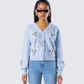 Olea Lavender Cherry Trim Cardigan model front