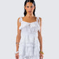 Shannyn White Ruffle Tie Top model front