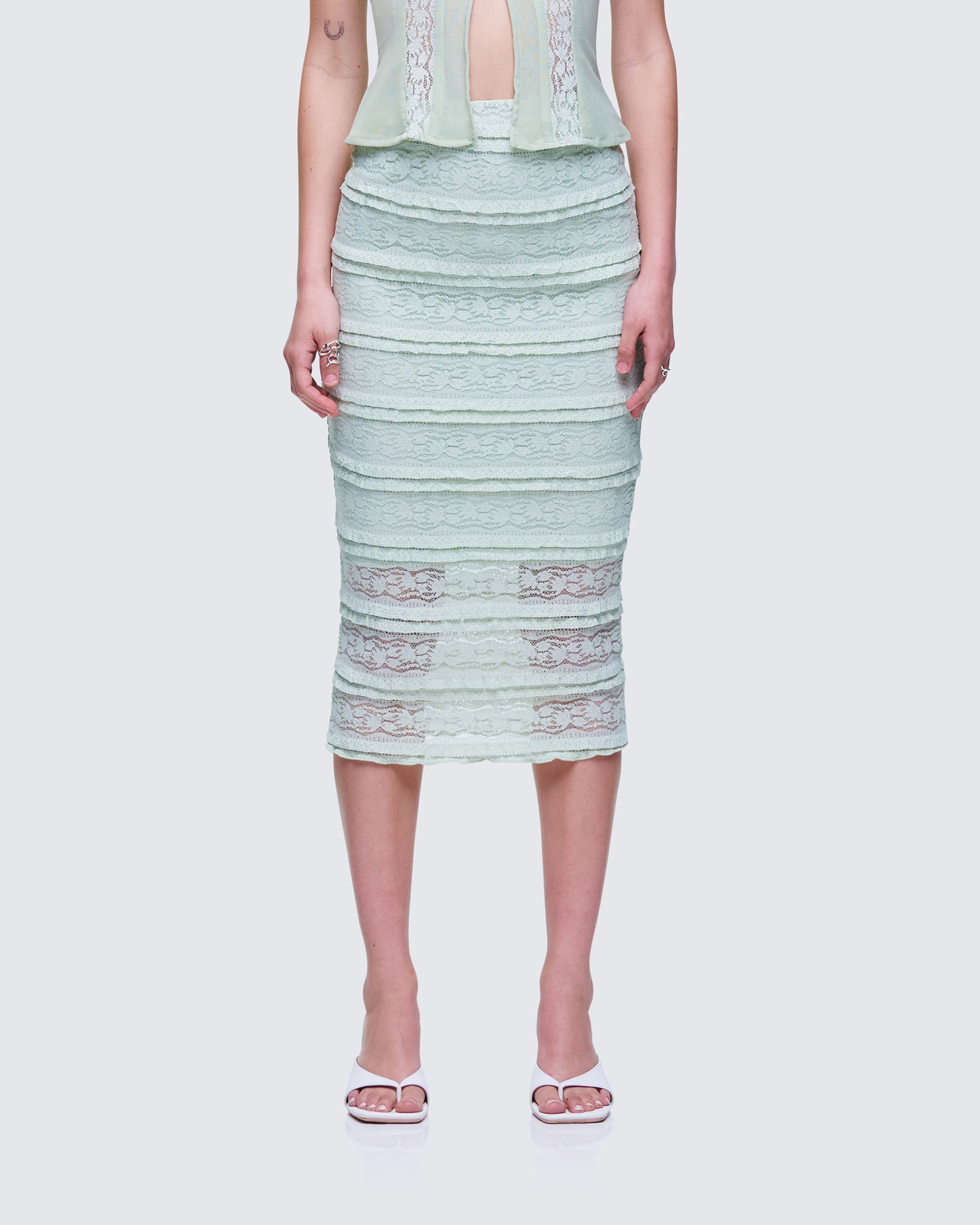 Ursuline Sage Ruffle Trim Skirt model front