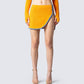 Riley Orange Mini Skirt model front